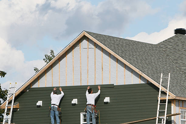Professional Emergency Siding Repair technician working in Brownsville, PA